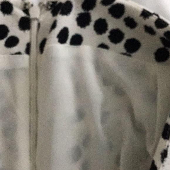 White with black dots mini skirt. - Picture 2 of 7